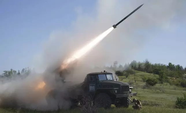 FILE - Soldiers of Ukraine's 30th Separate Mechanized Brigade fire a rocket toward Russian positions at the front line in the Donetsk region of Ukraine on Tuesday, June 3, 2025. (AP Photo/Andrii Marienko, File)