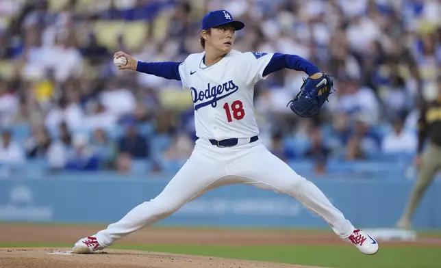 Los Angeles Dodgers starting pitcher Yoshinobu Yamamoto throws to a San Diego Padres batter during the first inning of a baseball game Thursday, June 19, 2025, in Los Angeles. (AP Photo/Mark J. Terrill)