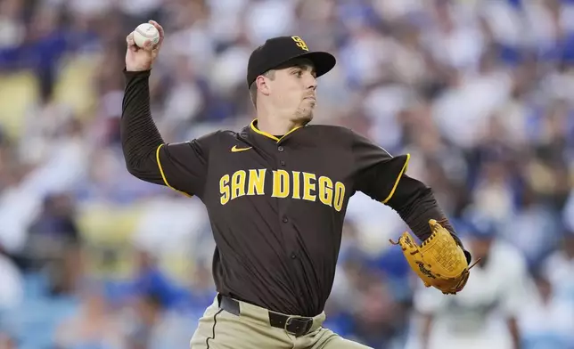 San Diego Padres starting pitcher Ryan Bergert throws to a Los Angeles Dodgers batter during the second inning of a baseball game Thursday, June 19, 2025, in Los Angeles. (AP Photo/Mark J. Terrill)