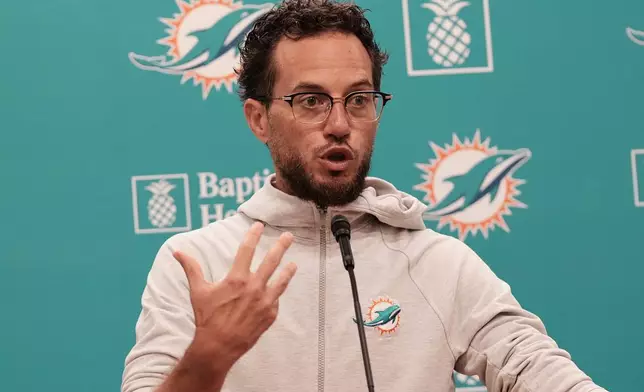 Miami Dolphins head coach Mike McDaniel speaks before an NFL football practice, Tuesday, June 3, 2025, in Miami Gardens, Fla. (AP Photo/Marta Lavandier)