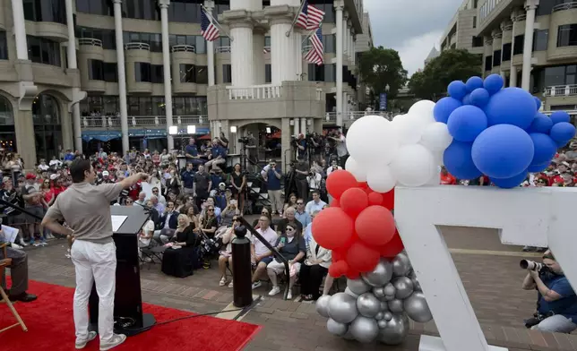Washington Capitals forward T.J. Oshie speaks to the crowd at Washington Harbour to announce his retirement from the NHL, Monday, June 9, 2025, in Washington. (AP Photo/Rod Lamkey, Jr.)