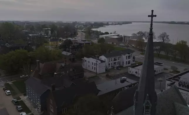 A church, bottom right, stands in downtown Evansville, Ind., Friday, April 11, 2025. (AP Photo/Joshua A. Bickel)