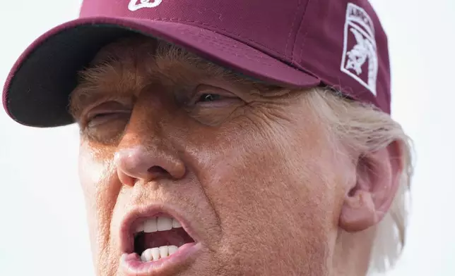 President Donald Trump speaks to reporters after arriving on Air Force One, Tuesday, June 10, 2025, at Joint Base Andrews, Md. (AP Photo/Alex Brandon)