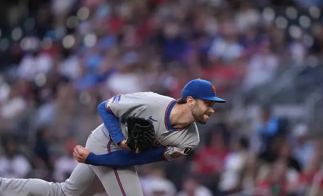 New York Mets pitcher David Peterson (23) delivers in the first inning of a baseball game against the Atlanta Braves, Tuesday, June 17, 2025, in Atlanta. (AP Photo/Brynn Anderson)