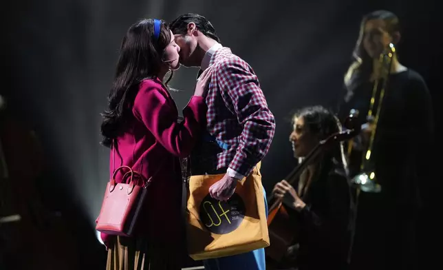 Helen J Shen, left, and Darren Criss perform "Never Fly Away" from "Maybe Happy Ending" during the 78th Tony Awards on Sunday, June 8, 2025, at Radio City Music Hall in New York. (Photo by Charles Sykes/Invision/AP)