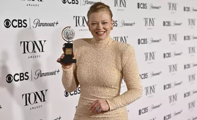 Sarah Snook poses in the press room with the award for best performance by an actress in a leading role in a play for "The Picture of Dorian Gray" during the 78th Tony Awards on Sunday, June 8, 2025, at Radio City Music Hall in New York. (Photo by Evan Agostini/Invision/AP)