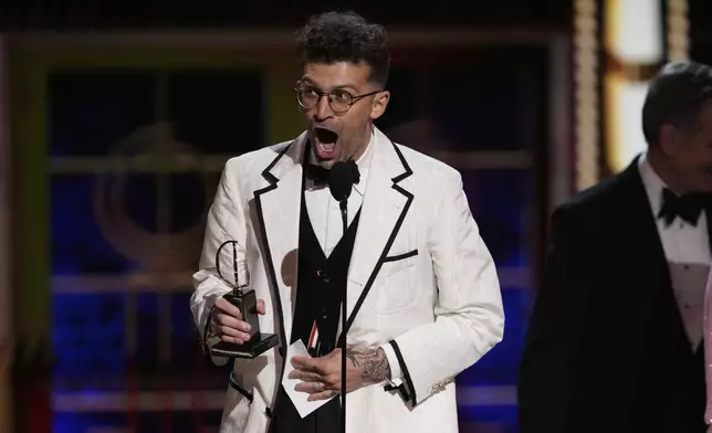 Sam Pinkleton accepts the award for best direction of a play for "Oh, Mary!" during the 78th Tony Awards on Sunday, June 8, 2025, at Radio City Music Hall in New York. (Photo by Charles Sykes/Invision/AP)