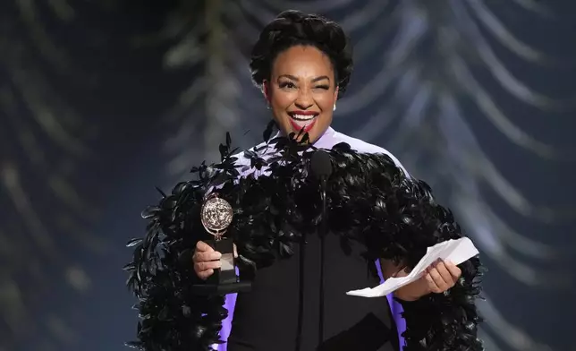 Natalie Venetia Belcon accepts the award for best performance by an actress in a featured role in a musical for "Buena Vista Social Club" during the 78th Tony Awards on Sunday, June 8, 2025, at Radio City Music Hall in New York. (Photo by Charles Sykes/Invision/AP)
