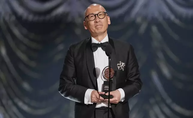 Francis Jue accepts the award for best performance by an actor in a featured role in a play for "Yellow Face during the 78th Tony Awards on Sunday, June 8, 2025, at Radio City Music Hall in New York. (Photo by Charles Sykes/Invision/AP)