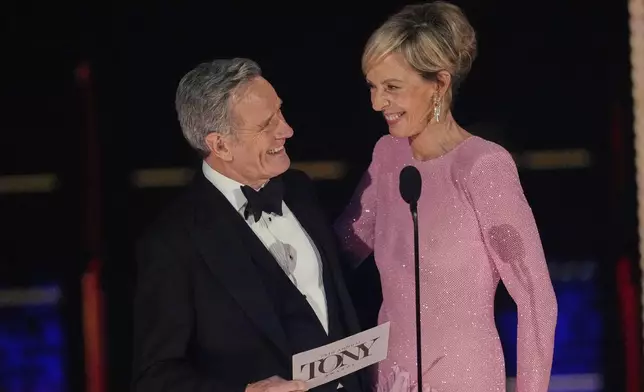 Bryan Cranston, left, and Allison Janney present the award for best direction of a play during the 78th Tony Awards on Sunday, June 8, 2025, at Radio City Music Hall in New York. (Photo by Charles Sykes/Invision/AP)