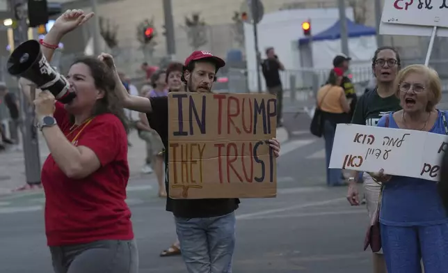 People take part in a protest demanding the end of the war and immediate release of hostages held by Hamas in the Gaza Strip, and against Prime Minister Benjamin Netanyahu's government in Tel Aviv, Israel, Saturday, June 28, 2025. (AP Photo/Ariel Schalit)