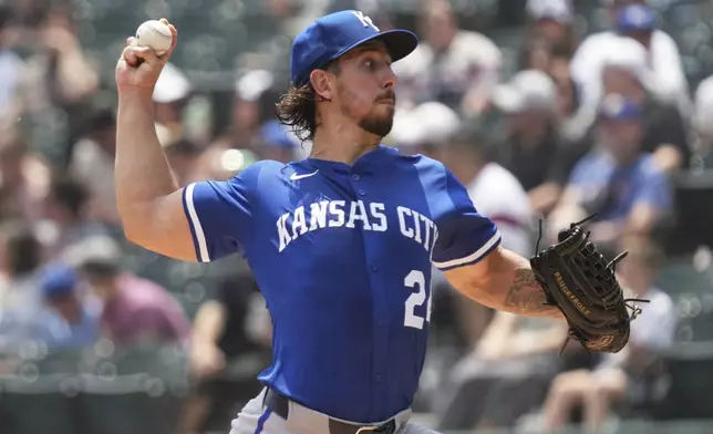 Kansas City Royals starting pitcher Michael Lorenzen throws against the Chicago White Sox during the first inning of a baseball game in Chicago, Sunday, June 8, 2025. (AP Photo/Nam Y. Huh)