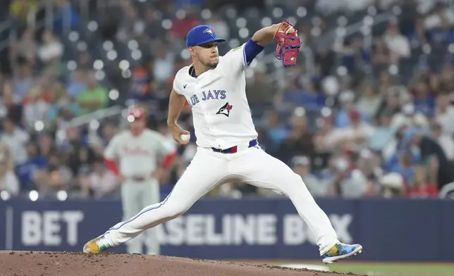 Toronto Blue Jays pitcher Jose Berrios (17) works against the Philadelphia Phillies during the first inning of a baseball game in Toronto, Wednesday, June 4, 2025. (Chris Young/The Canadian Press via AP)