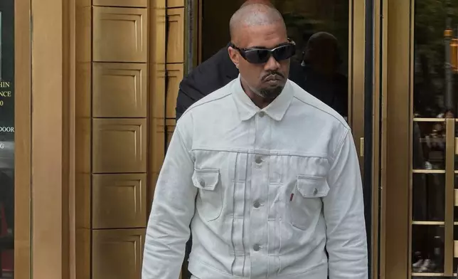 Ye, the rapper formerly known as Kanye West, leaves federal court during the trial of Sean "Diddy" Combs in New York, Friday, June 13, 2025. (AP Photo/Michael R. Sisak)