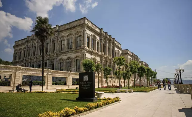 Security officers patrol outside the Ciragan Palace, where Ukraine-Russia peace talks are taking place in Istanbul, Turkey, Monday, June 2, 2025. (AP Photo/Emrah Gurel)