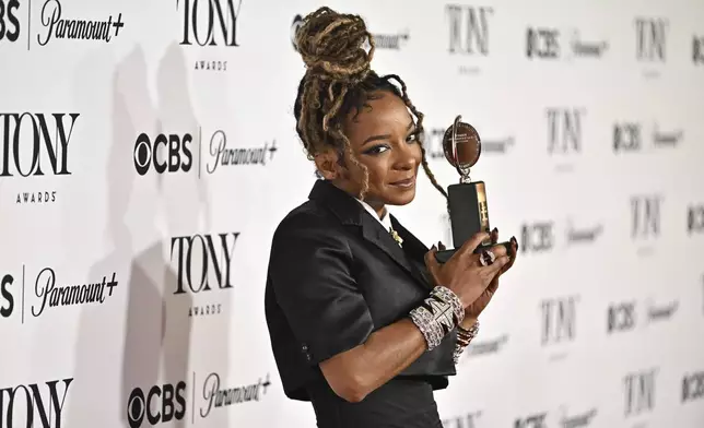 Kara Young poses in the press room with the award for best performance by an actress in a featured role in a play for "Purpose" during the 78th Tony Awards on Sunday, June 8, 2025, at Radio City Music Hall in New York. (Photo by Evan Agostini/Invision/AP)