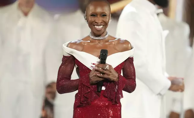 Host Cynthia Erivo, center, performs during the 78th Tony Awards on Sunday, June 8, 2025, at Radio City Music Hall in New York. (Photo by Charles Sykes/Invision/AP)