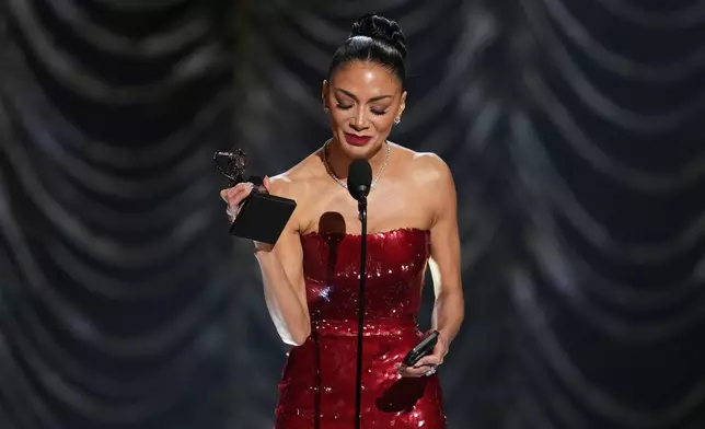 Nicole Scherzinger accepts the award for best performance by an actress in a leading role in a musical for "Sunset Blvd." during the 78th Tony Awards on Sunday, June 8, 2025, at Radio City Music Hall in New York. (Photo by Charles Sykes/Invision/AP)