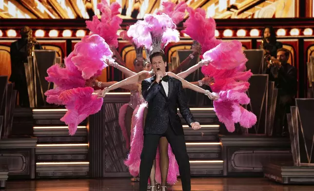 Jonathan Groff performs a medley "Just in Time" during the 78th Tony Awards on Sunday, June 8, 2025, at Radio City Music Hall in New York. (Photo by Charles Sykes/Invision/AP)