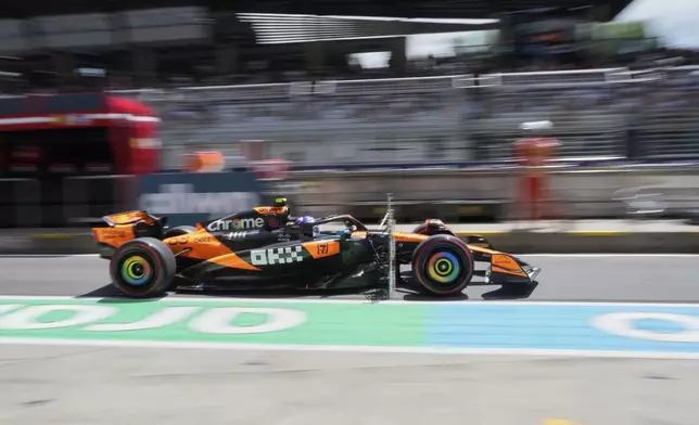 Mclaren driver Alex Dunne of Ireland leaves the pit lane during the first free practice at the Red Bull Ring racetrack, ahead of the Austrian Formula One Grand Prix in Spielberg, Austria, Friday, June 27, 2025. (AP Photo/Darko Bandic)