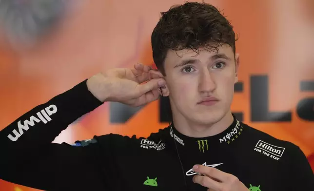 Mclaren driver Alex Dunne of Ireland prepares for the first free practice at the Red Bull Ring racetrack, ahead of the Austrian Formula One Grand Prix in Spielberg, Austria, Friday, June 27, 2025. (AP Photo/Darko Bandic)