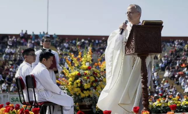 FILE - Pope Leo XIV, then Apostolic Administrator of Chiclayo Robert Prevost, preaches during a Corpus Christi celebration in a stadium in Chiclayo, Peru, Friday, June 19, 2015. (AP Photo/Julio Reano, File)