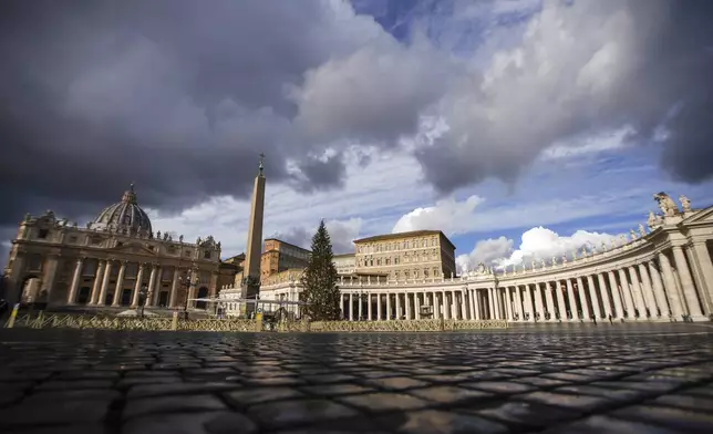 FILE - A view of the empty St. Peter's Square as Pope Francis is delivering the Angelus noon prayer from his studio, at the Vatican, Jan. 6, 2021. (AP Photo/Andrew Medichini, File)