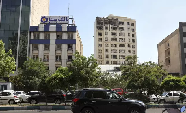 The top floor of an apartment building damaged in an Israeli army strike is seen in Tehran, Iran's capital, Friday, June 13, 2025. (AP Photo)