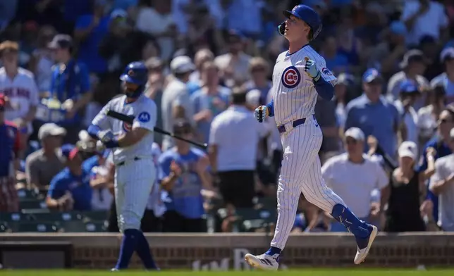 Chicago Cubs' Pete Crow-Armstrong (4) runs the bases after hitting a home run during the fifth inning of a baseball game against the Seattle Mariners, Saturday, June 21, 2025, in Chicago. (AP Photo/Erin Hooley)