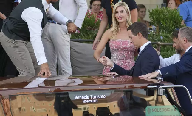 Ivanka Trump, center left, and Jared Kushner, center right, leave a hotel ahead of the anticipated wedding celebrations of Jeff Bezos and Lauren Sanchez, in Venice, Italy, Friday, June 27, 2025. (AP Photo/Antonio Calanni)