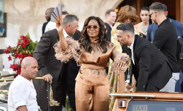 Oprah Winfrey leaves a hotel during celebrations for Jeff Bezos and Lauren Sanchez Bezos' wedding, in Venice, Saturday, June 28, 2025. (AP Photo/Luigi Costantini)