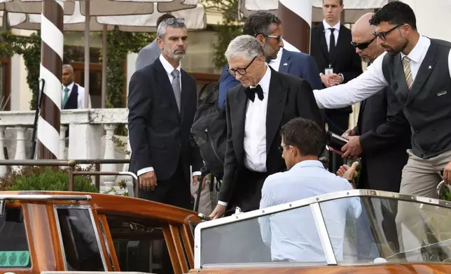 Bill Gates leaves a hotel ahead of the anticipated wedding celebrations of Jeff Bezos and Lauren Sanchez, in Venice, Italy, Friday, June 27, 2025. (AP Photo/Luigi Costantini)