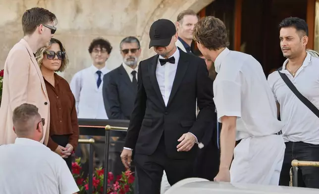 Leonardo Di Caprio leaves a hotel ahead of the anticipated wedding celebrations of Jeff Bezos and Lauren Sanchez, in Venice, Italy, Friday, June 27, 2025. (AP Photo/Luigi Costantini)