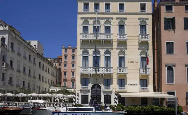 Police patrols outside a hotel on the Grand Canal in Venice, Italy, Friday,June 27, 2025 ahead of the anticipated wedding celebrations of Jeff Bezos and Lauren Sanchez. (AP Photo/Antonio Calanni)