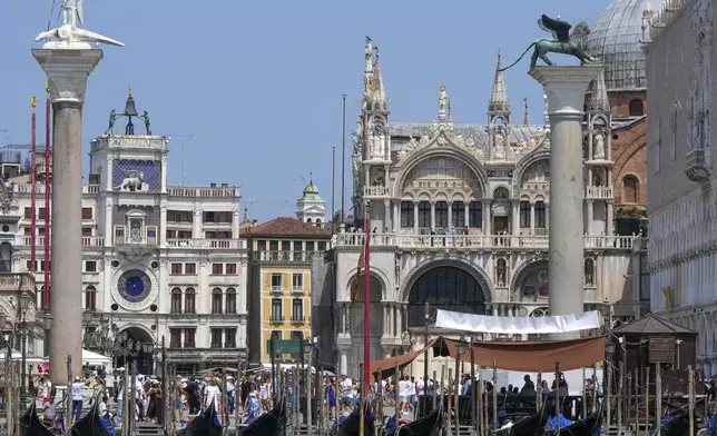 Gondolas are moored outside St. Mark's Square in Venice, Italy, on Wednesday, June 25, 2025, ahead of festivities in the lagoon city reportedly linked to a wedding celebration for Jeff Bezos and Lauren Sánchez. (AP Photo/Luca Bruno)