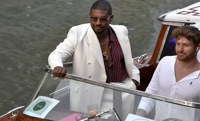 Usher arrives in Venice, Italy, Thursday, June 26, 2025, ahead of Jeff Bezos' wedding. (AP Photo/Luigi Costantini)