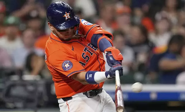 Houston Astros' Isaac Paredes hits a home run against the Chicago White Sox during the fifth inning of a baseball game Thursday, June 12, 2025, in Houston. (AP Photo/David J. Phillip)