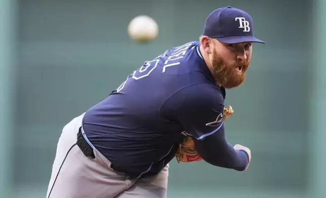 Tampa Bay Rays pitcher Zack Litell delivers during the first inning of a baseball game against the Boston Red Sox at Fenway Park, Wednesday, June 11, 2025, in Boston. (AP Photo/Charles Krupa)