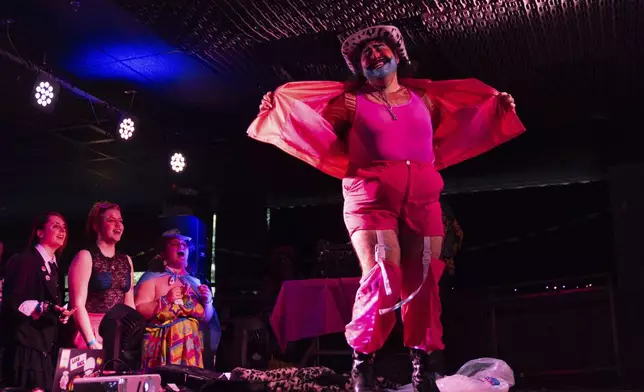 Will Wantme performs during a "Pink Pony Prom" held to celebrate teen and young adult members of the LGBTQ+ community on Friday, May 30, 2025, in Portland, Ore. (AP Photo/Jenny Kane)