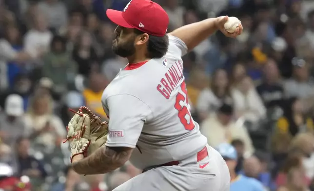 St. Louis Cardinals pitcher Andre Granillo throws during his major league debut during the seventh inning of a baseball game against the Milwaukee Brewers, Thursday, June 12, 2025, in Milwaukee. (AP Photo/Kayla Wolf)