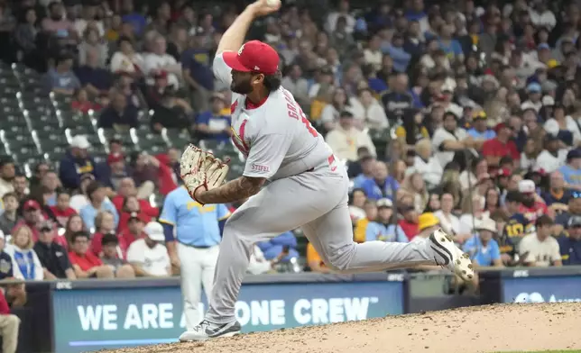 St. Louis Cardinals pitcher Andre Granillo throws against Milwaukee Brewers' Isaac Collins during his major league debut in the sixth inning of a baseball game Thursday, June 12, 2025, in Milwaukee. (AP Photo/Kayla Wolf)