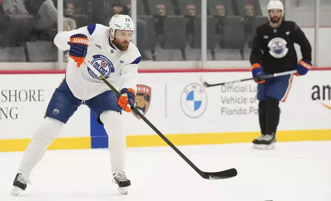 Edmonton Oilers forward Leon Draisaitl takes part in a drill during practice at the NHL Stanley Cup Finals in Fort Lauderdale, Fla., Tuesday, June 10, 2025.(Nathan Denette/The Canadian Press via AP)