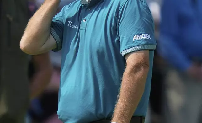 Shane Lowry, of Ireland, reacts to his shot on the second hole during the first round of the U.S. Open golf tournament at Oakmont Country Club Thursday, June 12, 2025, in Oakmont, Pa. (AP Photo/Seth Wenig)