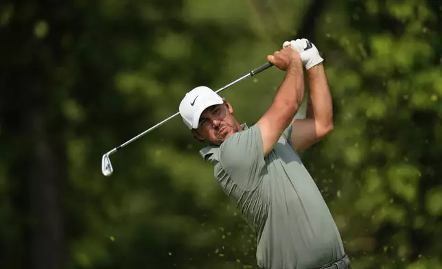 Brooks Koepka tees off on the 13th hole during the first round of the U.S. Open golf tournament at Oakmont Country Club Thursday, June 12, 2025, in Oakmont, Pa. (AP Photo/Carolyn Kaster)