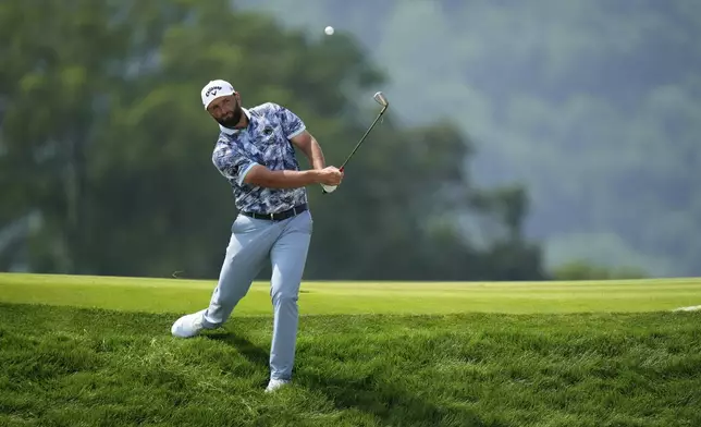 Jon Rahm, of Spain, plays his ball on the 17th hole during the first round of the U.S. Open golf tournament at Oakmont Country Club Thursday, June 12, 2025, in Oakmont, Pa. (AP Photo/Seth Wenig)