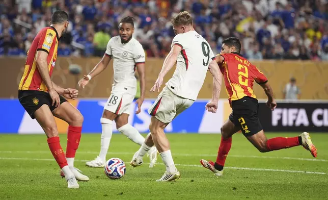 Chelsea's Liam Delap, centre, scores his team's second goal during the Club World Cup Group D soccer match between Esperance Tunisie and Chelsea in Philadelphia, Tuesday, June 24, 2025. (AP Photo/Matt Slocum)