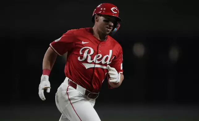 Cincinnati Reds' Spencer Steer rounds the bases after hitting a two-run homer in the first inning of a baseball game against the Minnesota Twins, Wednesday, June 18, 2025, in Cincinnati. (AP Photo/Carolyn Kaster)