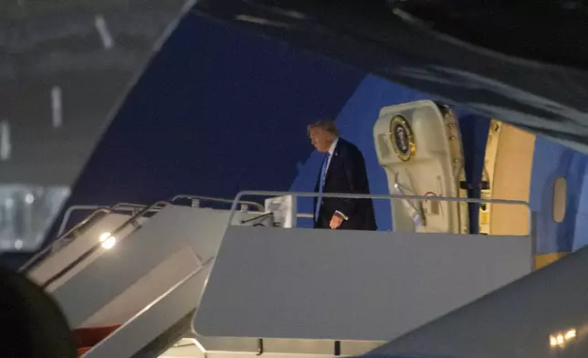President Donald Trump arrives on Air Force One at Joint Base Andrews, Md., Tuesday, June 17, 2025. (AP Photo/Rod Lamkey, Jr.)