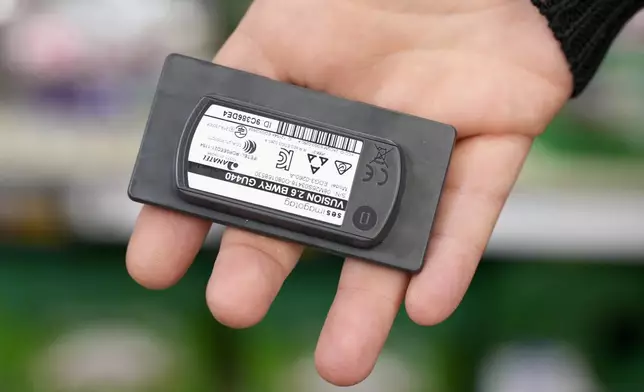Electronic grocery labels are displayed at a Kroger grocery store, in Monroe, Ohio, Nov. 13, 2024. (AP Photo/Jeff Dean)