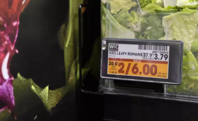 Electronic grocery labels are displayed at a Kroger grocery store, in Monroe, Ohio, Nov. 13, 2024. (AP Photo/Jeff Dean)